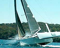 Racing trimaran at speed