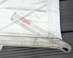 Close-up of a stitched sail repair